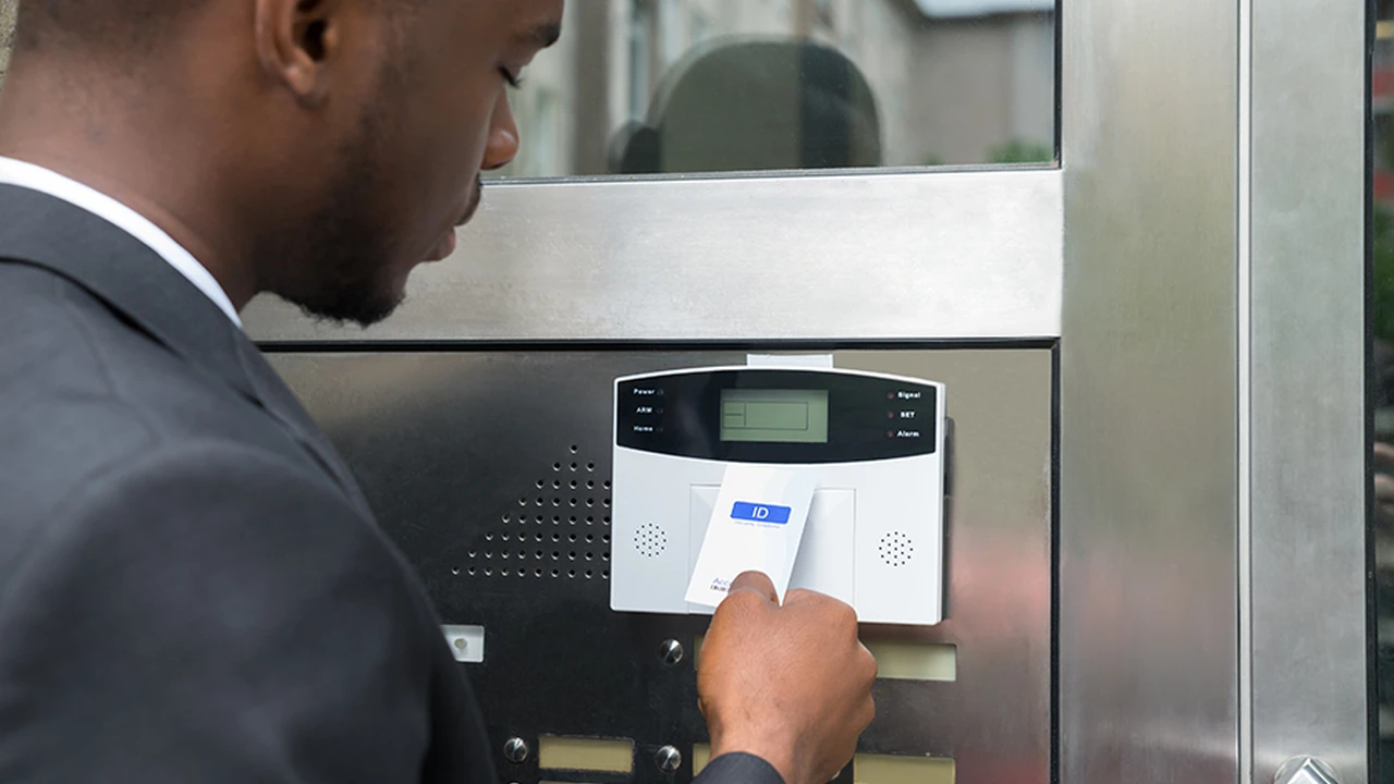 Close up on a plate of mashed potatoes, topped with baked pork chops with cream of mushroom soup, and a side of green beans.